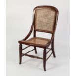 LATE VICTORIAN MAHOGANY STAINED FRUITWOOD NURSING CHAIR, the moulded show wood frame with
