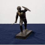 A TWENTIETH CENTURY 'BRONZED' SPELTER FIGURE OF A ROMAN GLADIATOR, on rectangular plinth base, 9" (