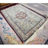 FINELY KNOTTED PAKISTAN PERSIAN PATTERN RUG with petal shaped brick red centre medallion with