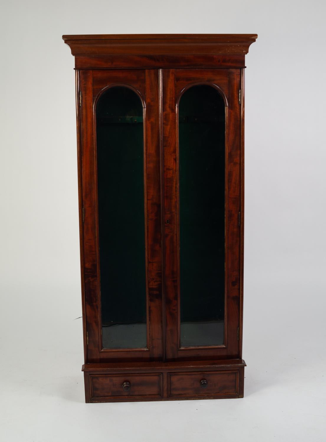 VICTORIAN AND LATER FIGURED MAHOGANY WALL MOUNTED GUN CABINET, the later oblong top and cornice