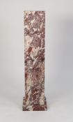 SOLID ROJO LEVANTE MARBLE PLINTH, of oblong form, with square base, 39 ½? (100.3cm) high overall,