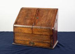 VICTORIAN PALE WALNUT WOOD SLOPE FRONT STATIONERY CABINET, with pair of panel doors and narrow hinge