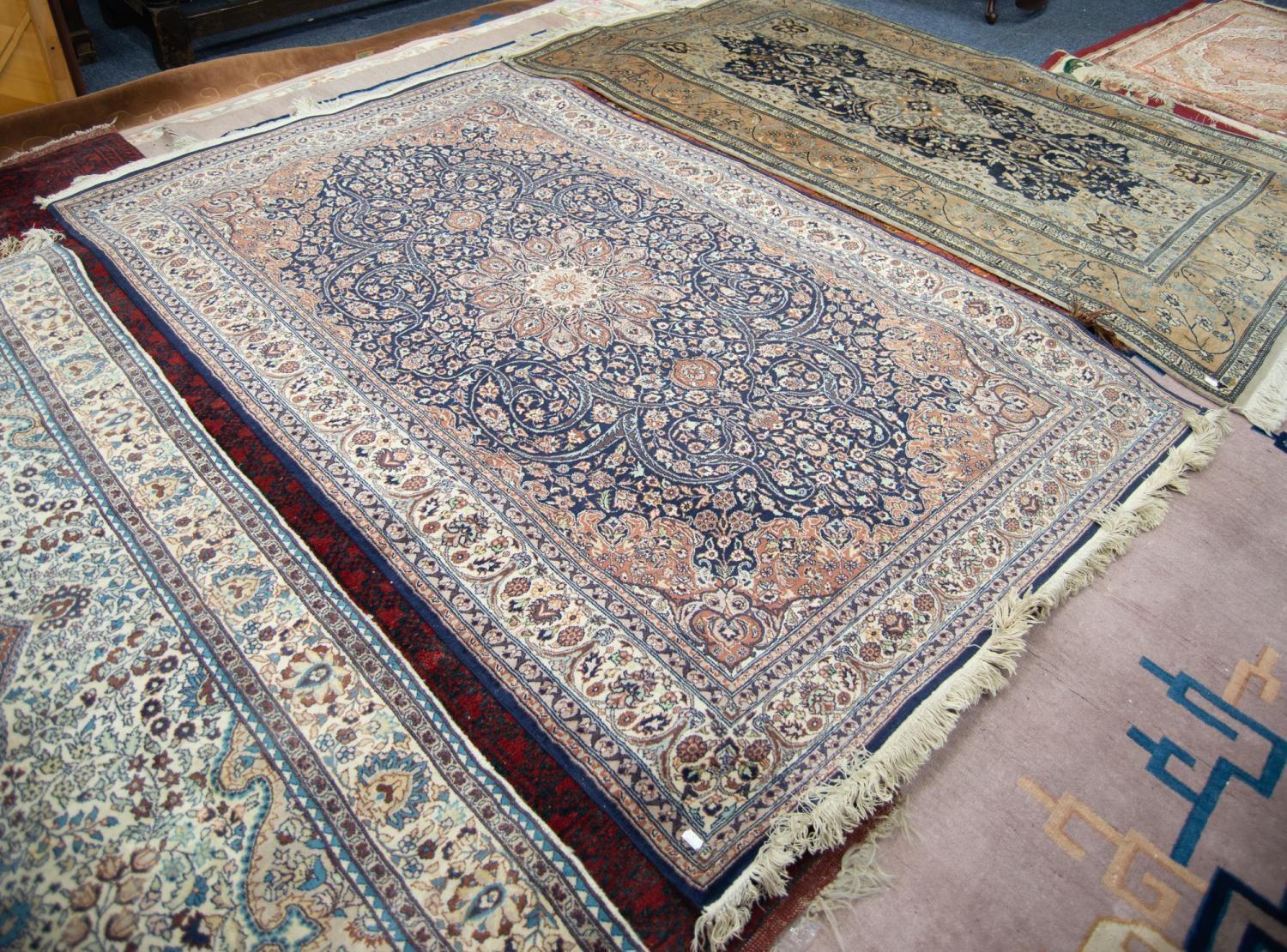 FINE QUALITY PAKISTAN KASHAN PATTERN FINELY KNOTTED RUG with intricate circular petal pattern centre