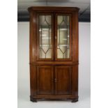 GEORGE III MAHOGANY CROSSBANDED OAK FLAT FRONTED TWO PART LARGE CORNER CUPBOARD, the upper section