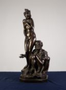 A TWENTIETH CENTURY COLD PAINTED BRONZE MODEL OF AN ARAB selling a naked female slave, on a canted