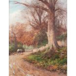 *JAMES WILLIAM STAMPER (1873-1947) OIL PAINTING ON CANVAS Man leading a horse down a country lane