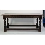 SEVENTEENTH CENTURY AND LATER CARVED DARK OAK LARGE SIDE OR REFECTORY TABLE, the later top above a