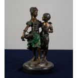 A TWENTIETH CENTURY PATINATED AND COLD PAINTED BRONZE GROUP  of two young ladies, one carrying a