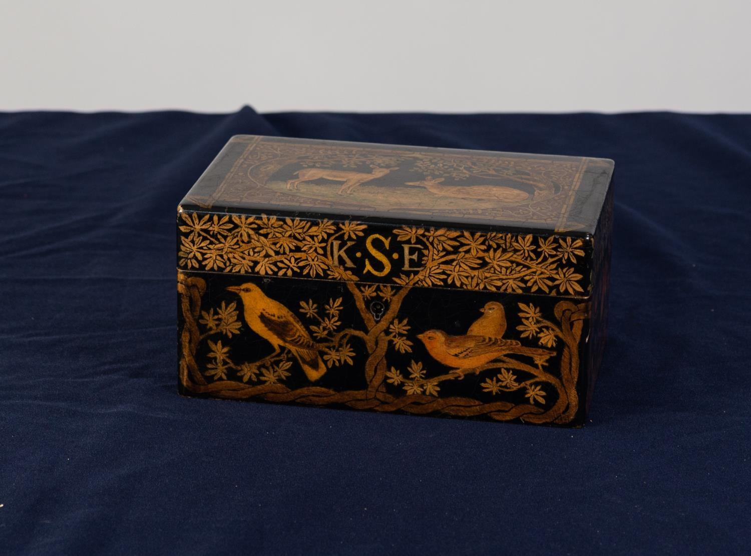 EARLY TWENTIETH CENTURY BLACK LACQUERED AND PENWORK DECORATED JEWELLERY BOX, of typical form the