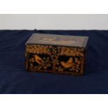 EARLY TWENTIETH CENTURY BLACK LACQUERED AND PENWORK DECORATED JEWELLERY BOX, of typical form the