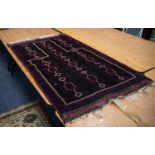 SHIRAZ, PERSIAN GEOMETRICAL PRAYER RUG with three rows of white stencilled hexagonal medallions with