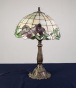 MODERN TIFFANY STYLE BRONZED COMPOSITION ELECTRIC TABLE LAMP AND SHADE, of typical form with