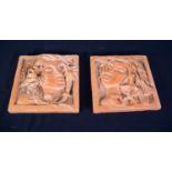 PAIR OF TERRA COTTA SQUARE WALL PLAQUES embossed in high relief with female heads in Art Nouveau