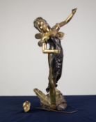 A TWENTIETH CENTURY POLISHED AND LACQUERED BRASS FEMALE FIGURE with butterfly wings rising from leaf