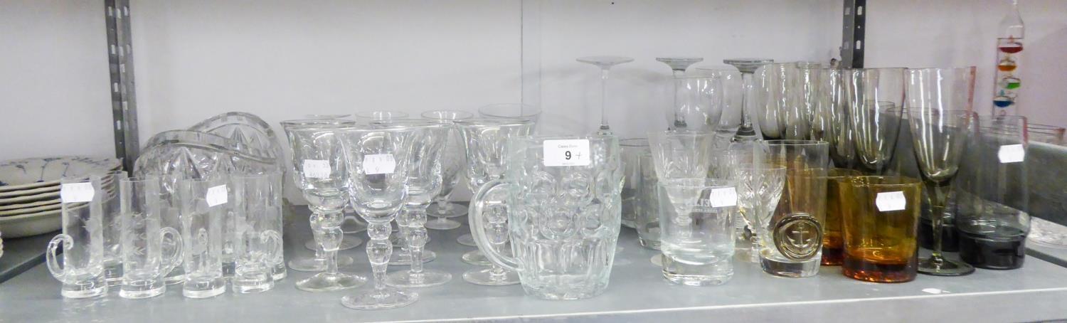 A HEAVY CUT GLASS BOAT SHAPED FRUIT BOWL, VARIOUS STEM WINE GLASSES AND A QUANTITY OF OTHER