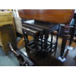 A NEST OF THREE OAK OBLONG COFFEE TABLES, OF JACOBEAN STYLE