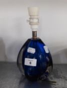 A HEAVY BLUE ART GLASS TABLE LAMP