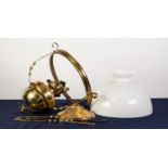 EARLY 20th CENTURY BRASS CEILING SUSPENDED OIL LAMP with opaque white glass shade