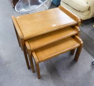 A DANISH STYLE NEST OF THREE COFFEE TABLES