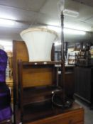 AN OAK STANDARD LAMP WITH SHADE AND AN OAK TWO TIER TEA TROLLEY (2)