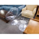 A PAIR OF CLEAR PLASTIC RETRO EGG CHAIRS