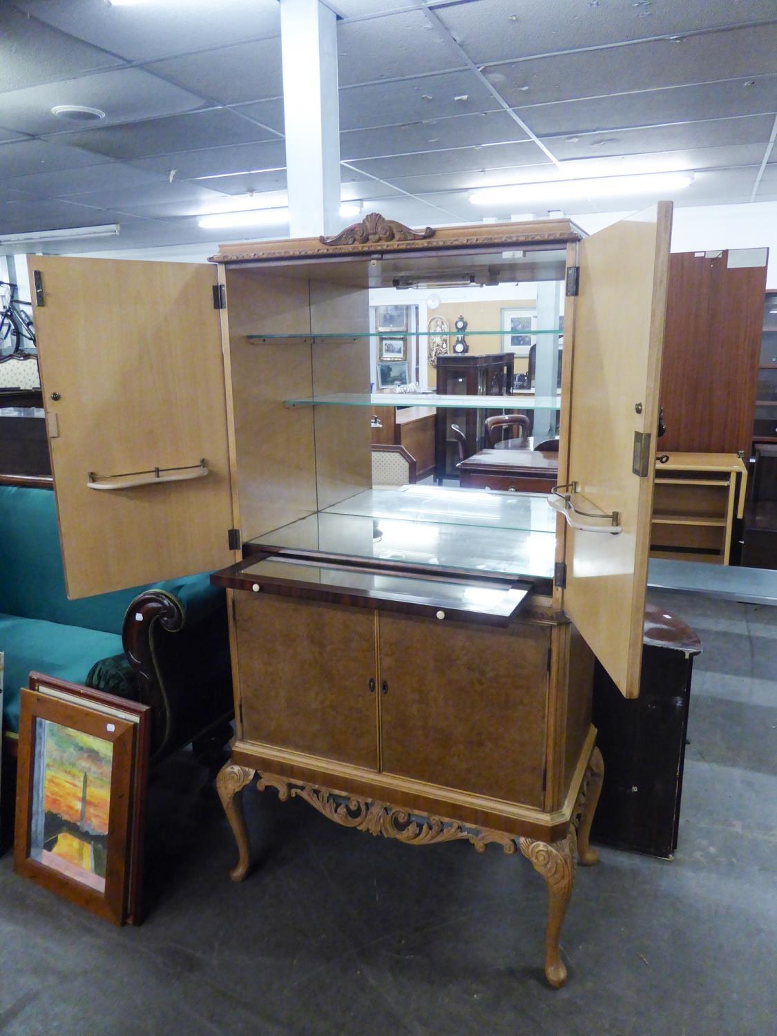 AN EPSTEIN STYLE 1930's COCKTAIL CABINET, RAISED ON CABRIOLE LEGS, WITH FITTED INTERIOR MIRROR AND - Image 2 of 2