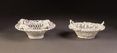 FLORAL ENCRUSTED PORCELAIN BASKET, of circular wire pattern with four upright loop handles to the