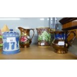 MAJOLICA POTTERY JUG, moulded with oak leaves, 5 ½? high, TWO COPPER LUSTRE JUGS, and a WEDGWOOD ?