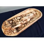 LARGE PLASTER STRAIGHT-SIDED OVAL WALL PANEL, moulded in free relief with a female figure bathing at