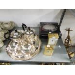 A FOUR PIECE ELECTROPLATE TEA SET, A CIRCULAR TRAY, AN E/P SUGAR SHAKER, SEVEN SILVER PLATE CIRCULAR