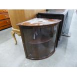 20TH CENTURY MAHOGANY BOW FRONT WALL HANGING CORNER CUPBOARD, WITH ONE GLAZED DOOR AND ONE