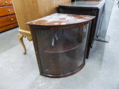 20TH CENTURY MAHOGANY BOW FRONT WALL HANGING CORNER CUPBOARD, WITH ONE GLAZED DOOR AND ONE