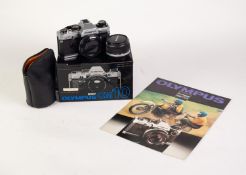 BOXED OLYMPUS OM10 SLR ROLL FILM CAMERA BODY, with instruction manual and shoulder strap, together