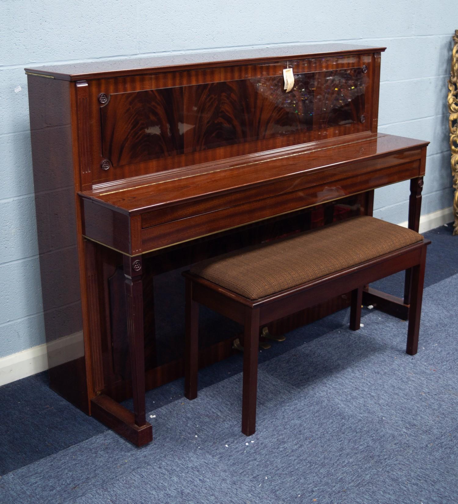 SCHIMMEL 'EMPIRE' MODEL GERMAN UPRIGHT PIANOFORTE, in high gloss figured mahogany rectilinear