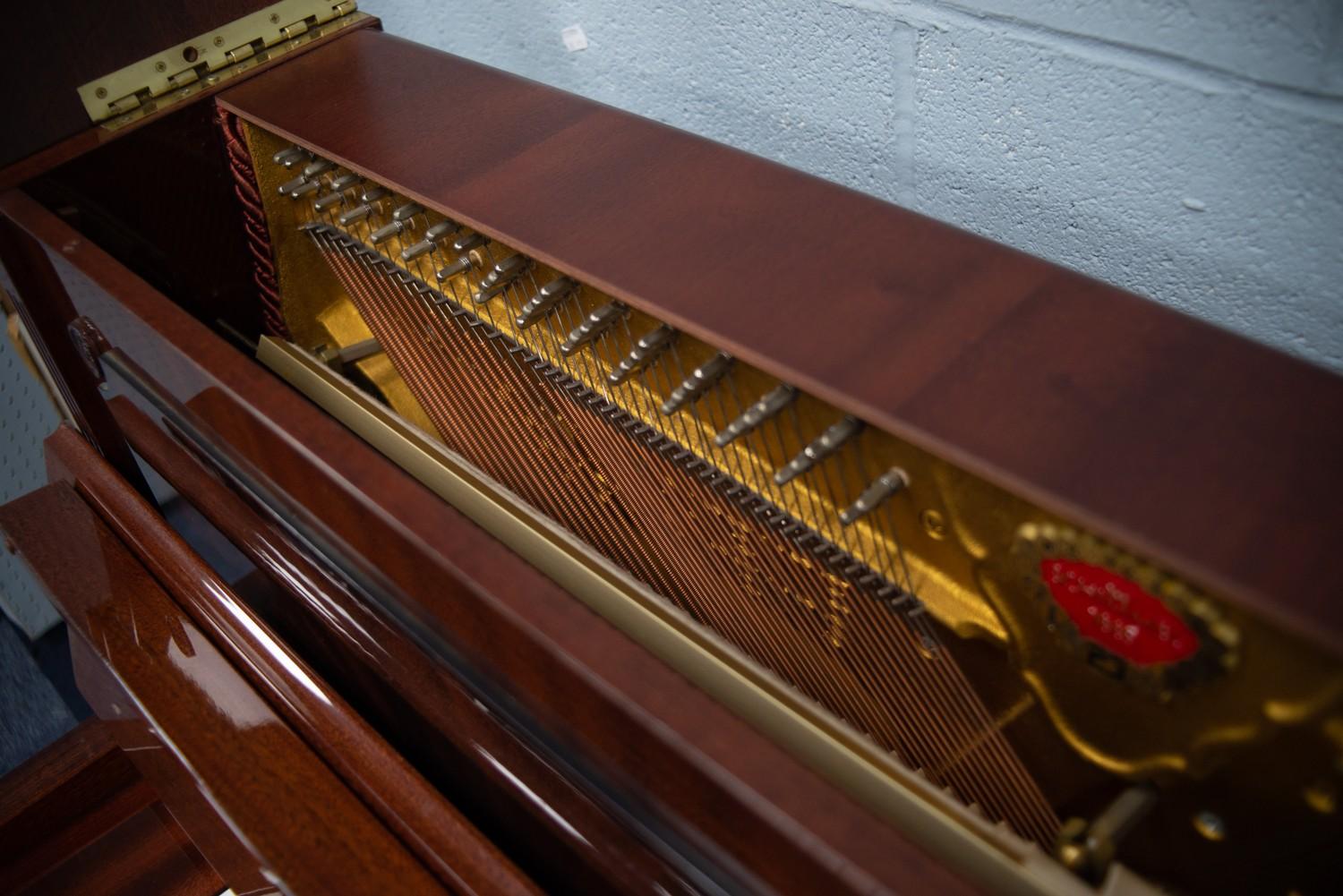 SCHIMMEL 'EMPIRE' MODEL GERMAN UPRIGHT PIANOFORTE, in high gloss figured mahogany rectilinear - Image 7 of 9