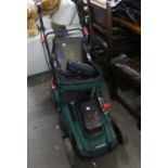 A BATTERY OPERATED HIGH SPEED 'PARKSIDE' LAWN MOWER WITH GRASS BOX