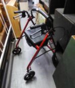 A FOUR WHEELED WALKING FRAME CONVERTING TO A SEAT
