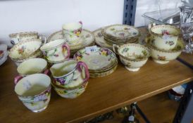 A CROWN STAFFORDSHIRE 'LYNTON' PATTERN 20 PIECE BONE CHINA TEA SERVICE FOR SIX (ONE CUP MISSING),