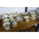 A CROWN STAFFORDSHIRE 'LYNTON' PATTERN 20 PIECE BONE CHINA TEA SERVICE FOR SIX (ONE CUP MISSING),