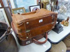 LIGHT TAN HIDE OVERNIGHT BAG, 18" WIDE AND A SMALL LEATHER CLOTH SUITCASE, 18" WIDE (2)