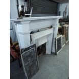 EDWARDIAN PLAIN WHITE PAINTED HARDWOOD FIRE SURROUND, 50 ½? x 60? and a WHITE PAINTED AND TILED