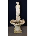 A LARGE ORNAMENTAL CONCRETE 'VENUS' ON CLAM SHELL GARDEN FOUNTAIN, RAISED ON A COLUMN STYLE BASE,