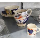 FOUR PIECES OF VICTORIAN 'GAUDY' POTTERY, DECORATED IN IMARI PALETTE, VIZ A PLAQUE, BOWL, JUG AND