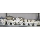 AN EXTENSIVE CHURCHILL POTTERY BREAKFAST SERVICE FOR NINE PERSONS  (APPROX 70 PIECES)