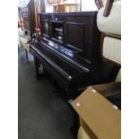 'THE TRIUMPH AUTO, LONDON?, PLAYER PIANO, in dark walnut case, 62 1/4" wide, 52" high, 28" deep (