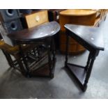 A SMALL CARVED OAK DEMI-LUNE HALL TABLE, ON THREE BALUSTER LEGS AND A NEST OF THREE CARVED OAK