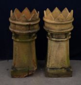 A PAIR OF TERRACOTTA CROWN TOP CHIMNEY POTS (DAMAGE TO BASE OF ONE A.F.), (84cm high)