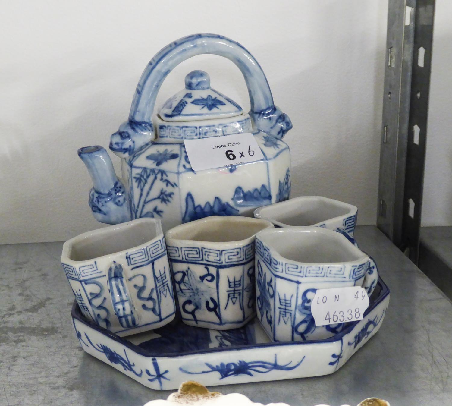 ORIENTAL BLUE AND WHITE CHINA SAKE SET, VIZ TEAPOT, 4 CUPS AND A TRAY (6)