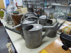 FOUR VINTAGE GALVANIZED WATERING CANS (4)