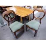 A SET OF SIX VICTORIAN MAHOGANY SPOON BACK DINING CHAIRS,  WITH LOOSE GREEN FABRIC SEATS (6)